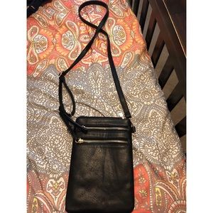 Black cross body with gold zippers